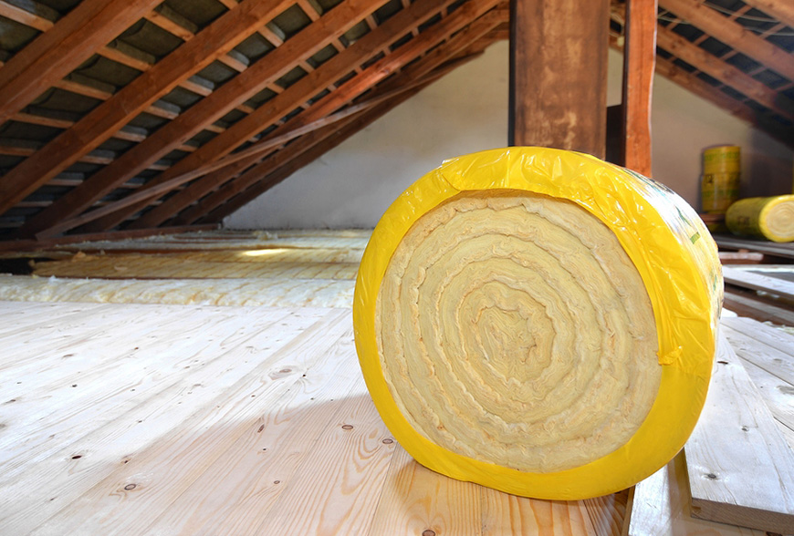 insulation being removed from attic